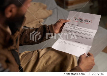 Receiving Eviction Notice at Home During Evening Receiving Eviction Notice at Home During Evening 117265182
