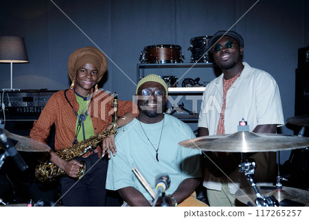 African American Musicians Posing With Musical Instruments Smiling 117265257