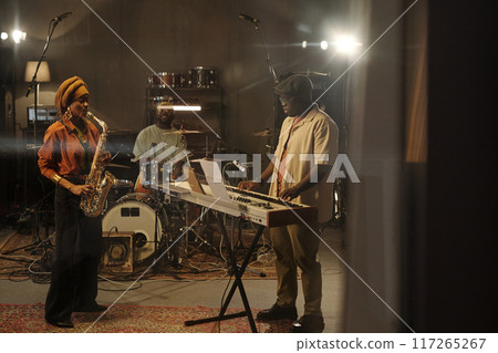 Performing Smooth Jazz in a Dimly Lit Studio Performing Smooth Jazz in a Dimly Lit Studio 117265267