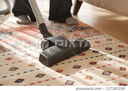 women cleaning with vacuum cleaner carpet, 117265289
