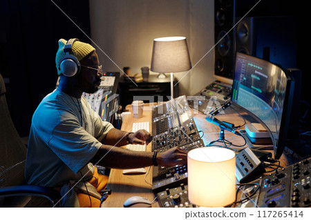 Recording Engineer Working in Professional Studio 117265414