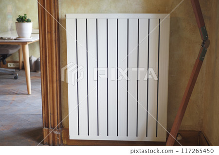 White radiator on grey white wall. apartment heating installation system, White radiator on grey white wall. apartment heating installation system, 117265450