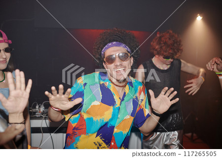 Guy dancing at disco party in night club Guy dancing at disco party in night club 117265505