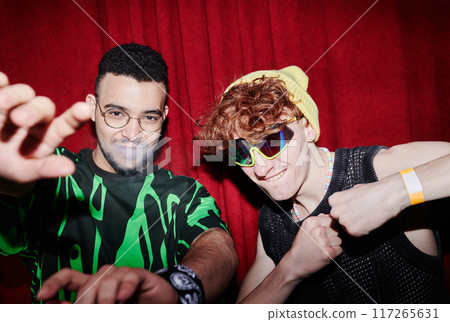 Two cool young men in funky apparel 117265631