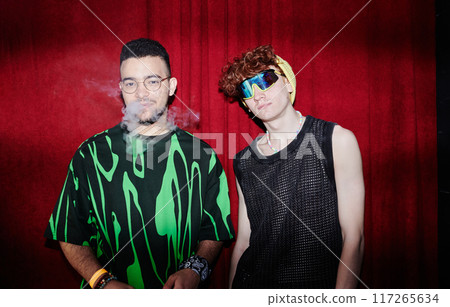 Two intercultural guys in stylish attire Two intercultural guys in stylish attire 117265634