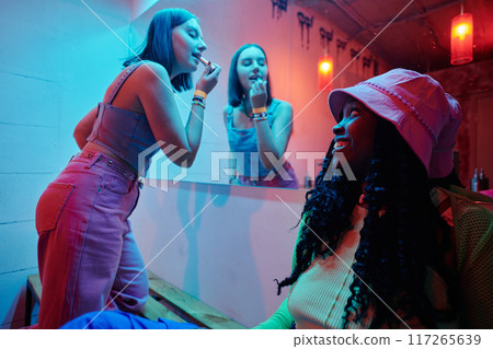Two cute intercultural girls in lavatory 117265639