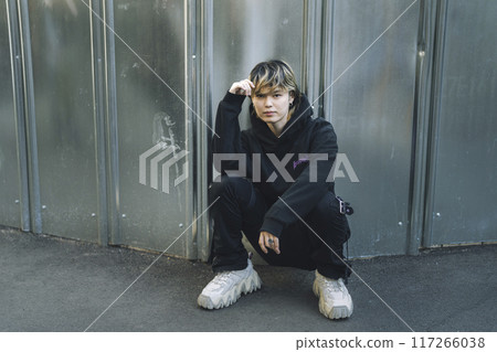 Portrait of a man in his twenties looking at the camera Portrait of a man in his twenties looking at the camera 117266038