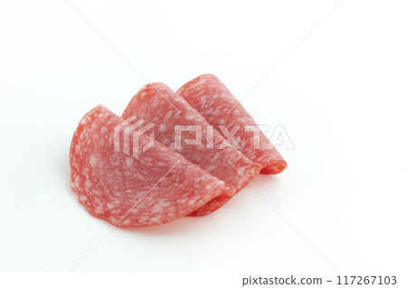 salami sausage cut into pieces isolated on white 117267103