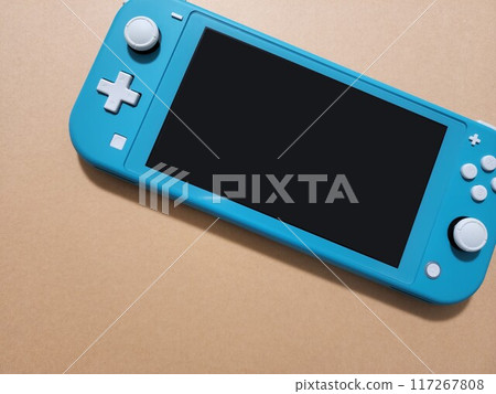 Photo of a small game console placed on the floor 117267808