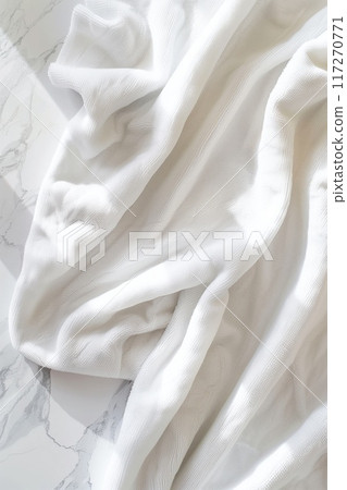 White fabric close-up with subtle pattern. Gray background reveals intricate design suitable for tech, eco, lifestyle. Texture abstract background in home decor, fashion, sports. White fabric close-up with subtle pattern. Gray background reveals intricate design suitable for tech, eco, lifestyle. Texture abstract background in home decor, fashion, sports. 117270771