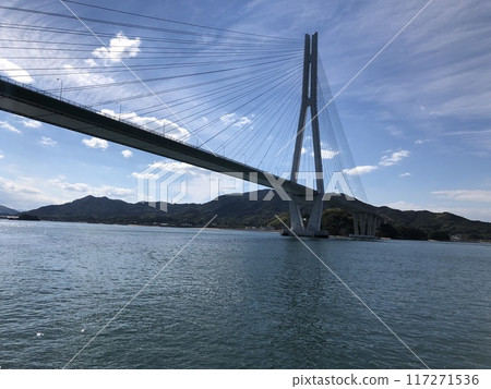 The bridge seen from Omishima Island on the Shimanami Kaido The bridge seen from Omishima Island on the Shimanami Kaido 117271536