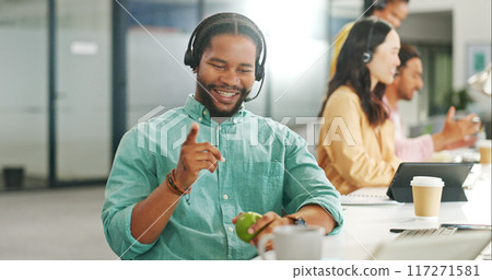 Call center, smile and a black man with an apple while working on a computer for sales or communication. Telemarketing, contact us and online support with a male employee as a consultant with fruit Call center, smile and a black man with an apple while working on a computer for sales or communication. Telemarketing, contact us and online support with a male employee as a consultant with fruit 117271581