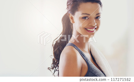 Healthy starts at home. Cropped portrait of an attractive young woman during her workout at home. Healthy starts at home. Cropped portrait of an attractive young woman during her workout at home. 117271582