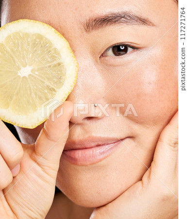 Skincare, beauty and portrait of an Asian woman with a lemon for body detox, health and wellness. Vitamin c, food and happy Japanese model with a fruit for diet, nutrition and vegan dermatology Skincare, beauty and portrait of an Asian woman with a lemon for body detox, health and wellness. Vitamin c, food and happy Japanese model with a fruit for diet, nutrition and vegan dermatology 117271764
