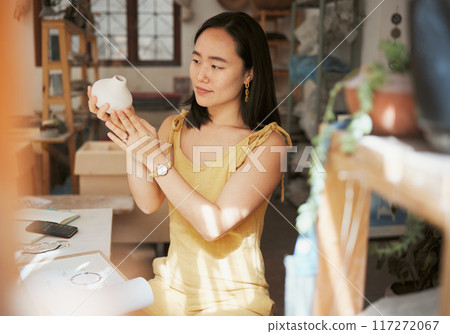 Woman, pottery product and designer in workshop, creative studio and manufacturing startup. Female small business owner, ceramic talent and artist working with sculpture, creativity and craft process 117272067