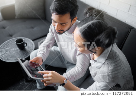Tablet, sofa and couple with smart home technology for thermostat heating, apartment security network or house automation. AI software, digital app monitor and people with interactive IOT electronics Tablet, sofa and couple with smart home technology for thermostat heating, apartment security network or house automation. AI software, digital app monitor and people with interactive IOT electronics 117272091