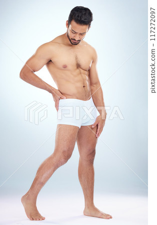 Fitness, underwear or man in studio for training, body exercise or bodybuilding workout for wellness. White background, motivation or healthy male model body builder with muscle development or goals 117272097