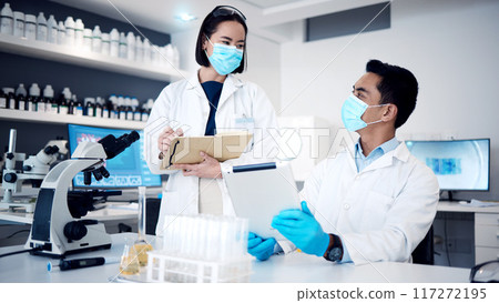 Science laboratory, team and tablet planning, vaccine research and pharmaceutical development of data analysis, investigation and innovation. Scientists, face mask and working on digital technology Science laboratory, team and tablet planning, vaccine research and pharmaceutical development of data analysis, investigation and innovation. Scientists, face mask and working on digital technology 117272195