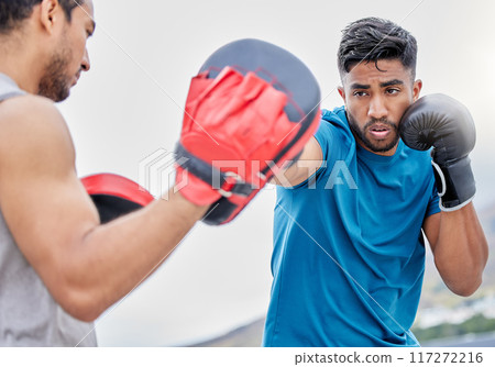 Gym, fitness and man boxing with coach, coaching and motivation for health, training and self defense. Workout, exercise and wellness commitment, strong athlete boxer outdoor in urban city or Brazil Gym, fitness and man boxing with coach, coaching and motivation for health, training and self defense. Workout, exercise and wellness commitment, strong athlete boxer outdoor in urban city or Brazil 117272216