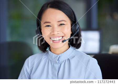 Portrait, call center and Asian woman for customer support, conversation and talking with smile, in office or happy. Client service, female agent and headset for telemarketing, speaking or consultant 117272443