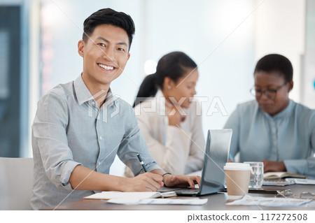 Coworking, smile and businessman working on a laptop, planning in a notebook and writing an idea at work. Portrait of an Asian, corporate and marketing worker with research and information on the web 117272508