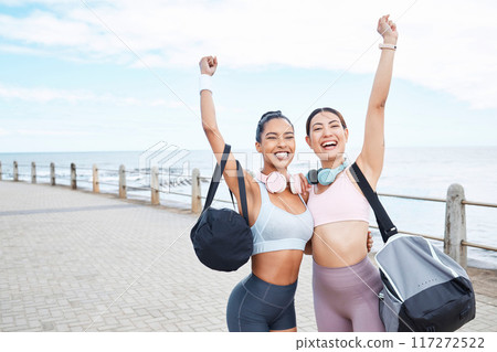 Fitness, runner friends portrait for success at beach sidewalk with victory hand in Los Angeles. Running, training and workout goal achievement with happy and proud women celebrating progress. Fitness, runner friends portrait for success at beach sidewalk with victory hand in Los Angeles. Running, training and workout goal achievement with happy and proud women celebrating progress. 117272522