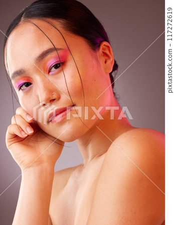 Portrait, Asian woman and makeup for natural beauty, wellness and happy with studio background for skincare. Cosmetics, young girl and body care for organic facial, smooth skin and creative neon face Portrait, Asian woman and makeup for natural beauty, wellness and happy with studio background for skincare. Cosmetics, young girl and body care for organic facial, smooth skin and creative neon face 117272619