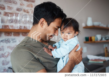 Baby, father and love while bonding and sharing a precious moment between infant girl and dad parent hugging and showing love, care and support at home. Happy man with cute child in their India house Baby, father and love while bonding and sharing a precious moment between infant girl and dad parent hugging and showing love, care and support at home. Happy man with cute child in their India house 117272803