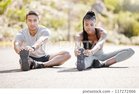 Fitness, road and couple stretching their legs to get ready for running, training and workout together in summer. Flexible, hamstring and healthy African girl with an Asian personal trainer outdoor 117272866