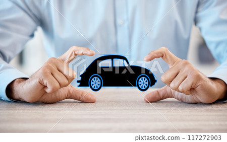 Man with model car in hands, promote business of insurance or vehicle finance at table in office. Businessman show toy auto, to advertise sale or motor repair workshop on desk at work or home Man with model car in hands, promote business of insurance or vehicle finance at table in office. Businessman show toy auto, to advertise sale or motor repair workshop on desk at work or home 117272903