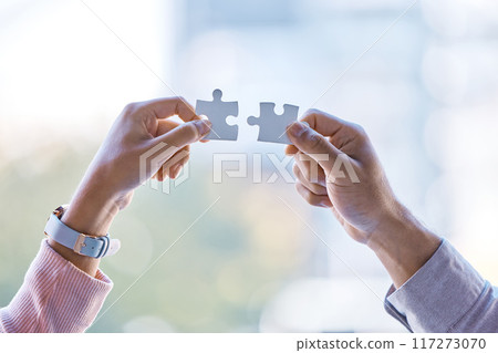 Puzzle, collaboration and teamwork between business people hands after business meeting for partnership, contract or merger. Vision, Innovation and corporate success after team work b2b strategy deal 117273070