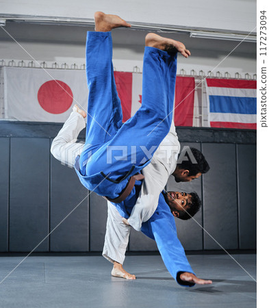 Health, fitness and motivation, men in karate fight for a winner in a dojo. Martial arts, a learning exercise to overcome, fight failure and beat the competition. Sports students in a battle to win. 117273094