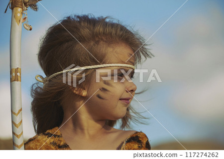Cute baby dressed in the clothes of primitive people Cute baby dressed in the clothes of primitive people 117274262
