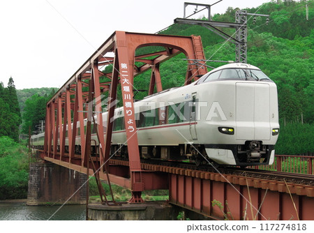 Sanin Main Line 287 series express train crossing the Daini Oyagawa Bridge in Kyoto Sanin Main Line 287 series express train crossing the Daini Oyagawa Bridge in Kyoto 117274818