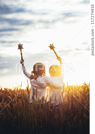 Little Ukrainian Children Boys With Maces - Bludgeon In Field. Bulava, Ukraine. Little Ukrainian Children Boys With Maces - Bludgeon In Field. Bulava, Ukraine. 117274916