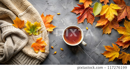 Autumn Tea and Sweater with Colorful Leaves 117276199