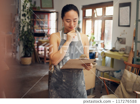 Woman, thinking or clipboard in pottery studio, ceramic small business or Asian art workshop on class schedule. Mud, craft or designer worker with clay vision, ideas or innovation on paper documents 117276588