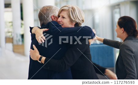 Congratulations You did it. Cropped shot of two mature businesspeople hugging each other while in the office during the day. Congratulations You did it. Cropped shot of two mature businesspeople hugging each other while in the office during the day. 117276593