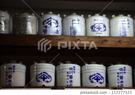 Soy sauce barrels at a soy sauce storehouse: Ceramic soy sauce barrels 117277323