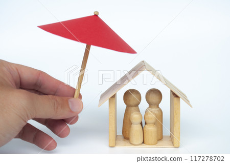 Hand holding umbrella with family figure background. Insurance coverage concept 117278702