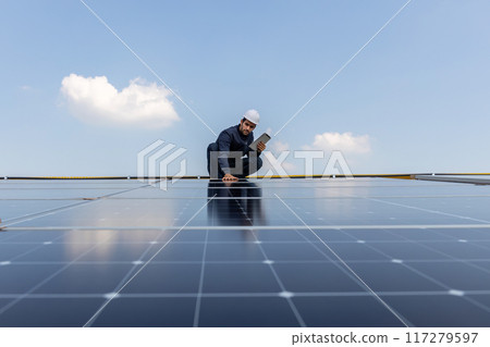 Engineer service check installation solar cell on the roof of factory. Engineer service check installation solar cell on the roof of factory. 117279597