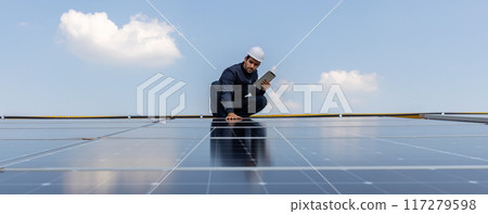 Engineer service check installation solar cell on the roof of factory. Engineer service check installation solar cell on the roof of factory. 117279598