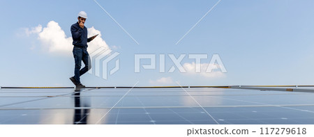Engineer service check installation solar cell on the roof of factory Engineer service check installation solar cell on the roof of factory 117279618