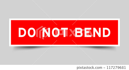 Red color square label sticker with word do not bend that inserted in gray background Red color square label sticker with word do not bend that inserted in gray background 117279681