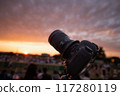 Setting up the camera at dusk 117280119
