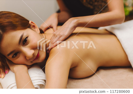 Relaxing with hand massage at beauty spa Relaxing with hand massage at beauty spa 117280600
