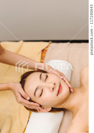 Relaxing with hand massage at beauty spa Relaxing with hand massage at beauty spa 117280643