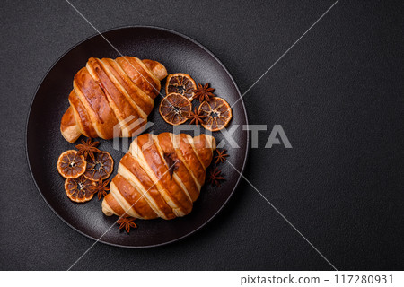 Delicious crispy sweet croissant cornet with chocolate Delicious crispy sweet croissant cornet with chocolate 117280931