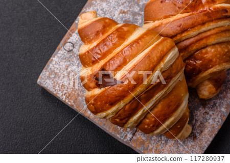 Delicious crispy sweet croissant cornet with chocolate Delicious crispy sweet croissant cornet with chocolate 117280937