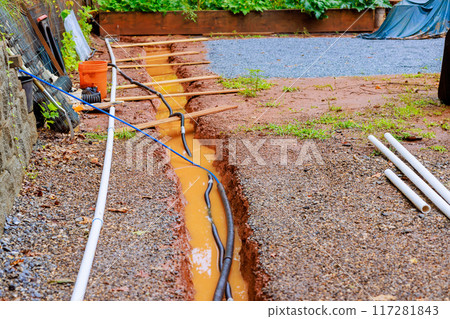 Drainage trench for communication cable floods during heavy rain Drainage trench for communication cable floods during heavy rain 117281843